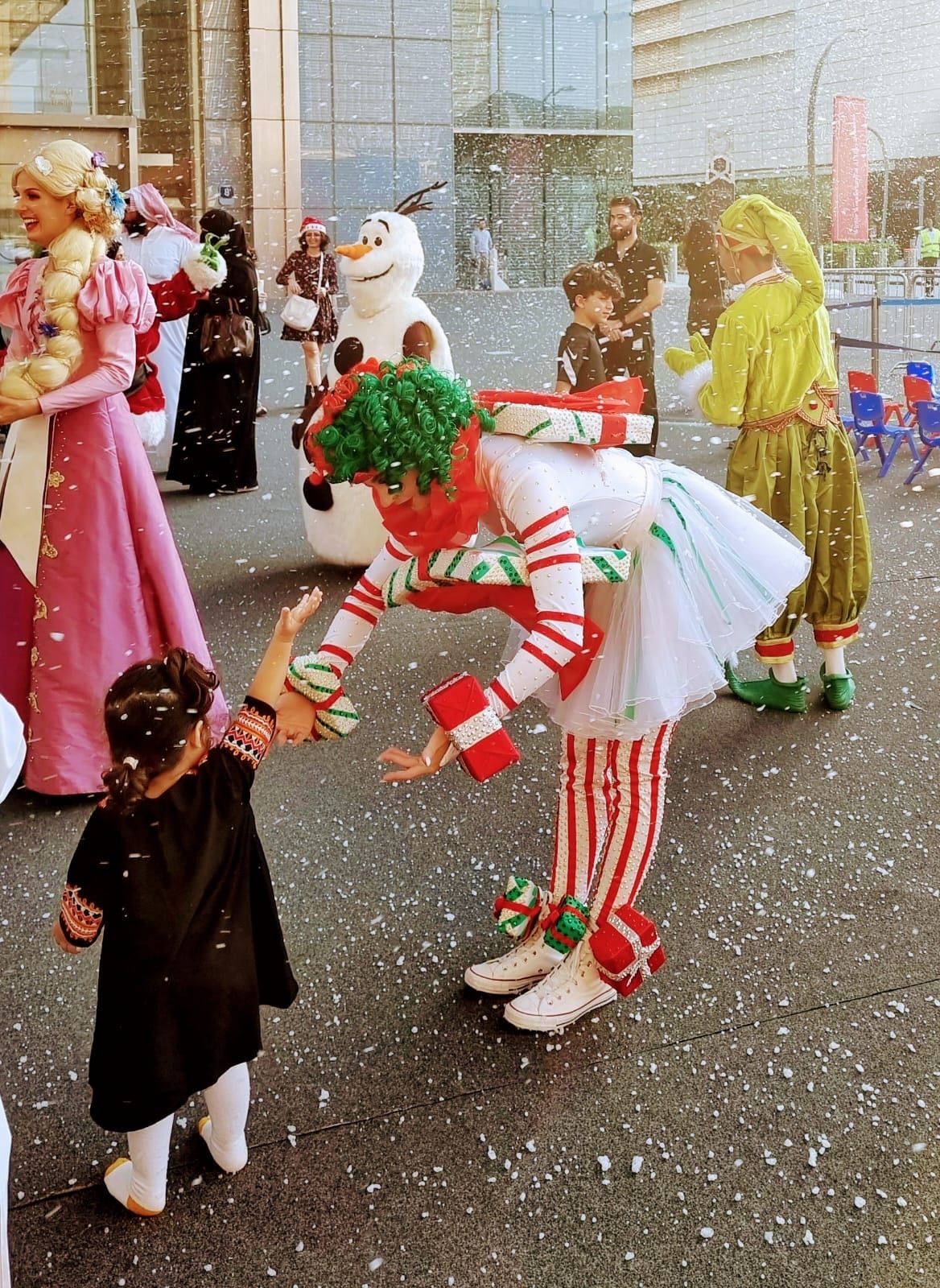 Santa performers dancing on stage